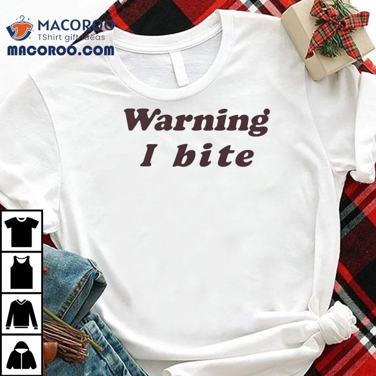 Brooklyn Wearing Warning I Bite Shirt
