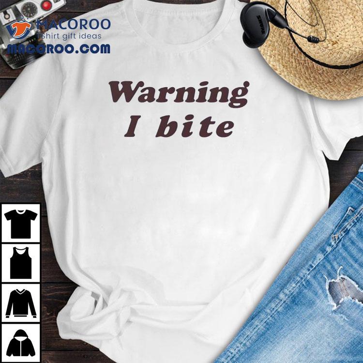 Brooklyn Wearing Warning I Bite Shirt