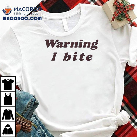Brooklyn Wearing Warning I Bite Shirt